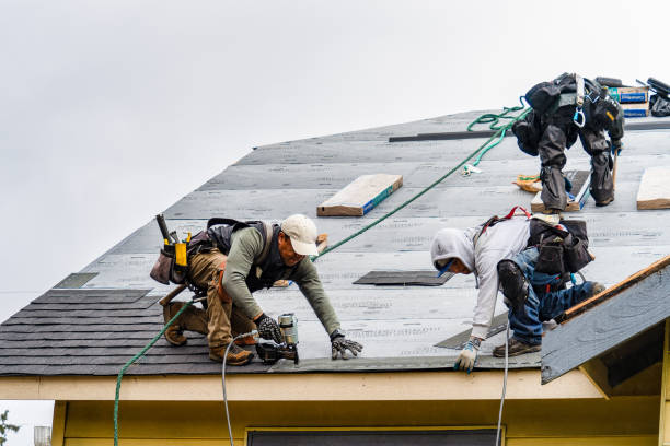 Professional Roofing technician working in Grand Blanc, MI